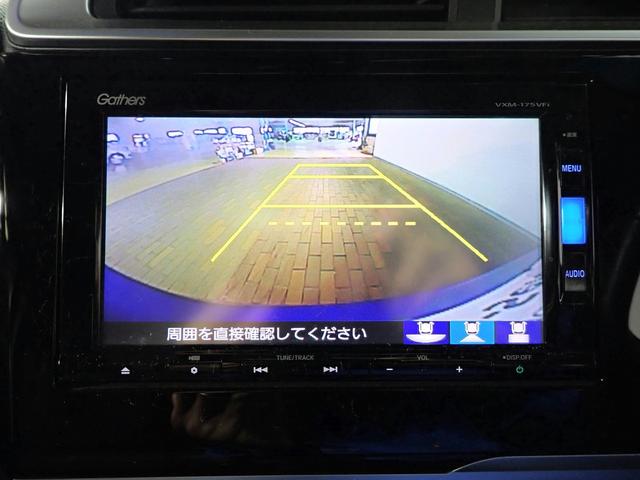 フィットハイブリッド Lパッケージ ギャザズSDナビ フルセグTV CD&DVD再生 ブルートゥース バックカメラ ETC車載器 LEDオートライト ワンオーナー あんしんパッケージ ハーフレザーシート アイドリングストップ(8枚目)