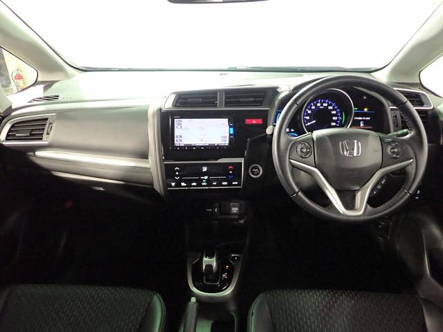 フィットハイブリッド Lパッケージ ギャザズSDナビ フルセグTV CD&DVD再生 ブルートゥース バックカメラ ETC車載器 LEDオートライト ワンオーナー あんしんパッケージ ハーフレザーシート アイドリングストップ(22枚目)