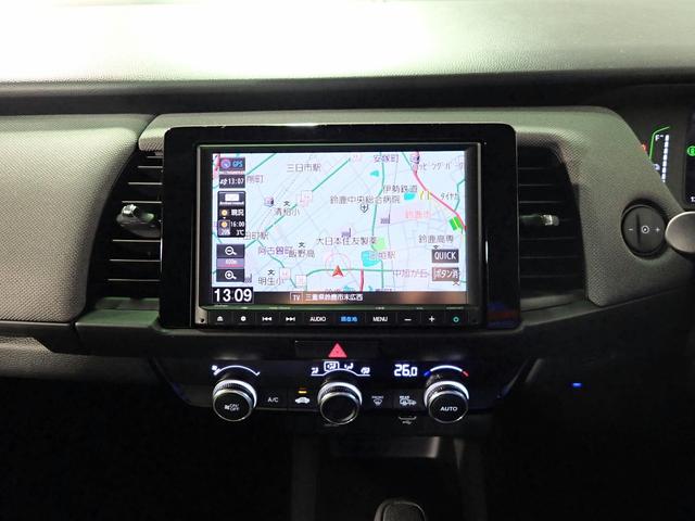 フィット ｅ：ＨＥＶクロスター　ギャザズ８インチＳＤナビ　フルセグＶ　ブルートゥース　バックカメラ　ＥＴＣ車載器　ＬＥＤオートライト　オートハイビーム　ワンオーナー　禁煙車　ドラレコ前後　パーキングセンサー　レーダークルーズＣ（8枚目）