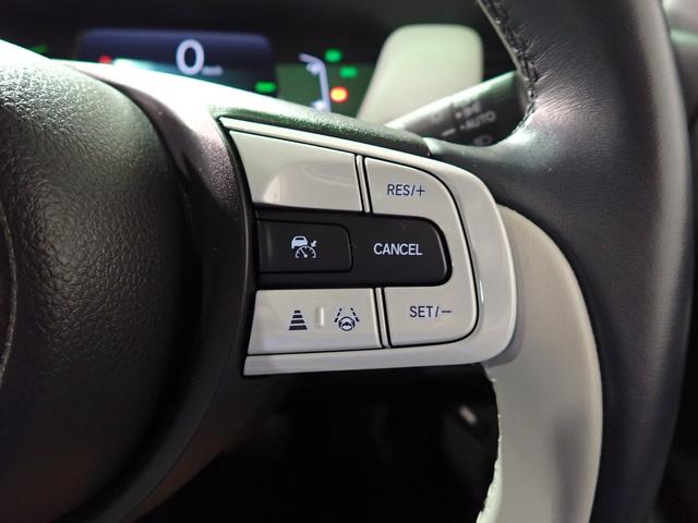 フィット ｅ：ＨＥＶホーム　オーディオレス　バックカメラ　ホンダセンシング　レーダークルーズＣ　ＬＥＤオートライト　オートハイビーム　ワンオーナー　禁煙車　パーキングセンサー　ハーブレザーシート　シートヒーター　ホンダセンシング（11枚目）