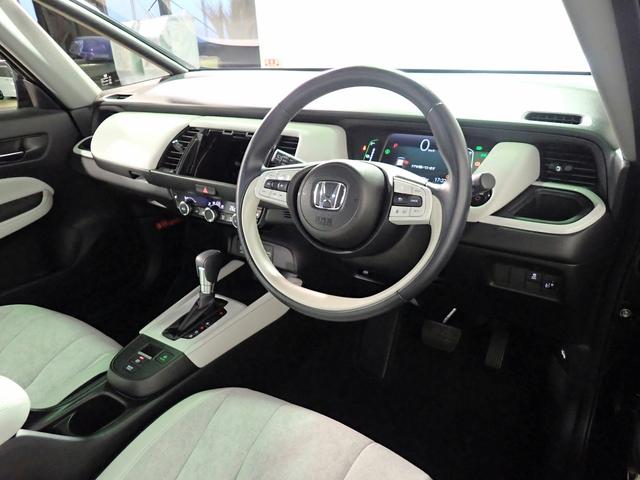 フィット ｅ：ＨＥＶホーム　オーディオレス　バックカメラ　ホンダセンシング　レーダークルーズＣ　ＬＥＤオートライト　オートハイビーム　ワンオーナー　禁煙車　パーキングセンサー　ハーブレザーシート　シートヒーター　ホンダセンシング（20枚目）