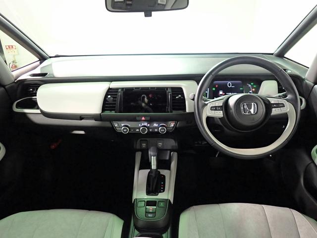 フィット ｅ：ＨＥＶホーム　オーディオレス　バックカメラ　ホンダセンシング　レーダークルーズＣ　ＬＥＤオートライト　オートハイビーム　ワンオーナー　禁煙車　パーキングセンサー　ハーブレザーシート　シートヒーター　ホンダセンシング（21枚目）