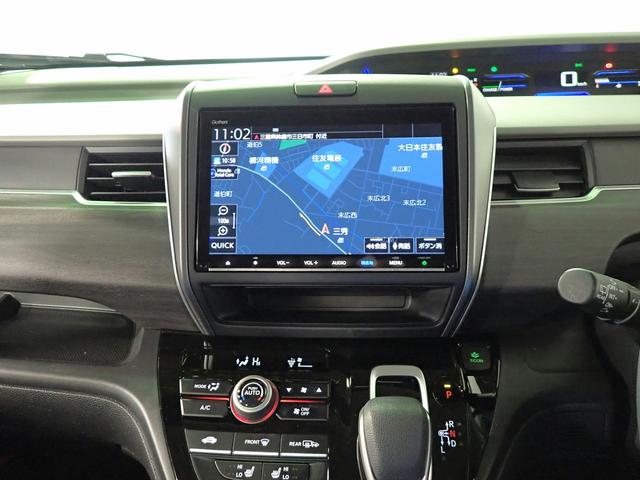 フリード＋ハイブリッド ハイブリッドＧ・ホンダセンシング　ギャザズ９インチメモリーナビ　フルセグＴＶ　ＣＤ＆ＤＶＤ再生　ブルートゥース　バックカメラ　ＥＴＣ車載器　両側電動スライドドア　シートヒーター　ＬＥＤオートライト　ワンオーナー　禁煙車　Ｓパッケージ（8枚目）