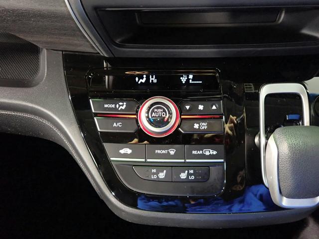 フリード＋ハイブリッド ハイブリッドＧ・ホンダセンシング　ギャザズ９インチメモリーナビ　フルセグＴＶ　ＣＤ＆ＤＶＤ再生　ブルートゥース　バックカメラ　ＥＴＣ車載器　両側電動スライドドア　シートヒーター　ＬＥＤオートライト　ワンオーナー　禁煙車　Ｓパッケージ（21枚目）