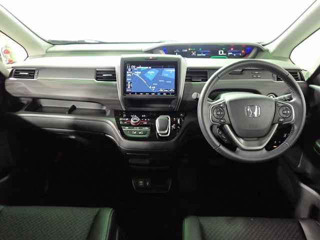 フリード＋ハイブリッド ハイブリッドＧ・ホンダセンシング　ギャザズ９インチメモリーナビ　フルセグＴＶ　ＣＤ＆ＤＶＤ再生　ブルートゥース　バックカメラ　ＥＴＣ車載器　両側電動スライドドア　シートヒーター　ＬＥＤオートライト　ワンオーナー　禁煙車　Ｓパッケージ（25枚目）