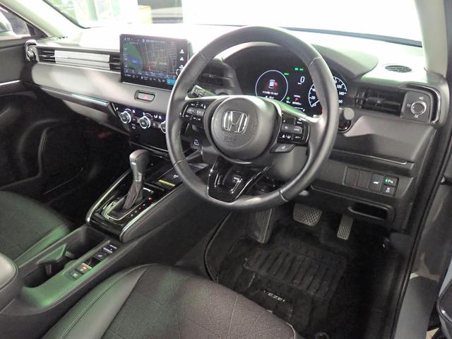 ヴェゼル ｅ：ＨＥＶＺ　ホンダコネクトナビ　フルセグＴＶ　ブルートゥース　バックカメラ　ＥＴＣ２．０　ＬＥＤオートライト　オートハイビーム　ワンオーナー　禁煙車　パーキングセンサー　パドルシフト　ワイヤレス充電　ＢＳＩ（24枚目）