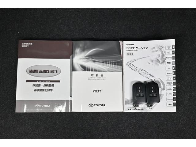 ヴォクシー ZS 煌II スマートキー・プッシュスタート バックガイドモニター セキュリティアラーム 両側パワスラドア ETC車載器 地デジテレビ 記録簿付き VSC LEDライト 助手席エアバック キーレスエントリー AC(17枚目)