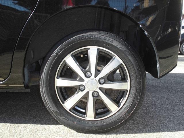 タント Ｌ　走行距離無制限・１年保証付・キーレスエントリー・ナビ・テレビ・バックカメラ・ＥＴＣ・両側スライドドア・シートカバー装着・社外アルミホイール（64枚目）