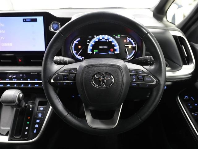 ノア ハイブリッドＳ－Ｚ　横滑り防止機能　エアバッグ　オートクルーズコントロール　地デジ　両側自動ドア　ダブルエアコン　スマートエントリー　ＬＥＤランプ　バックモニター　メモリナビ　３列シート　ＥＴＣ付き　ＡＢＳ　ＡＣ１００Ｖ（24枚目）