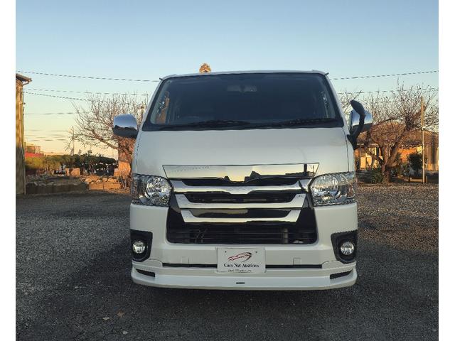 ハイエースバン ロングスーパーＧＬマルチロールトランスポータタイプＩ　ダークプライム　ディーゼルターボ　モデリスタエアロ　ＬＥＤオプションヘッドライト　リアスポイラー　パールホワイト　ハーフレザーシート　両側スライドドア　テレビ　バックカメラ　プッシュスタート　ＥＴＣ（5枚目）