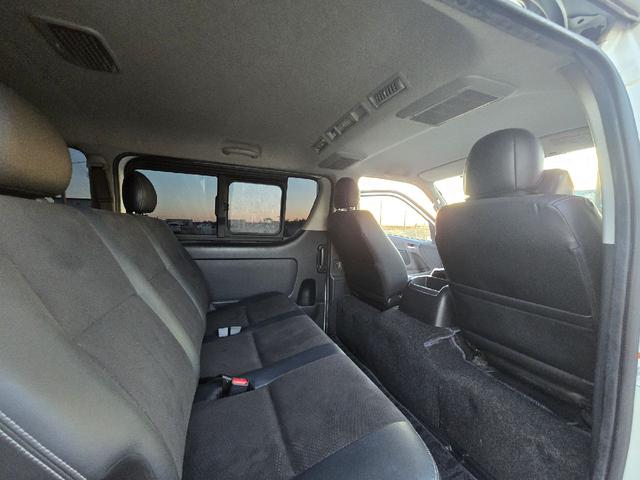 ハイエースバン ロングスーパーＧＬマルチロールトランスポータタイプＩ　ダークプライム　ディーゼルターボ　モデリスタエアロ　ＬＥＤオプションヘッドライト　リアスポイラー　パールホワイト　ハーフレザーシート　両側スライドドア　テレビ　バックカメラ　プッシュスタート　ＥＴＣ（20枚目）