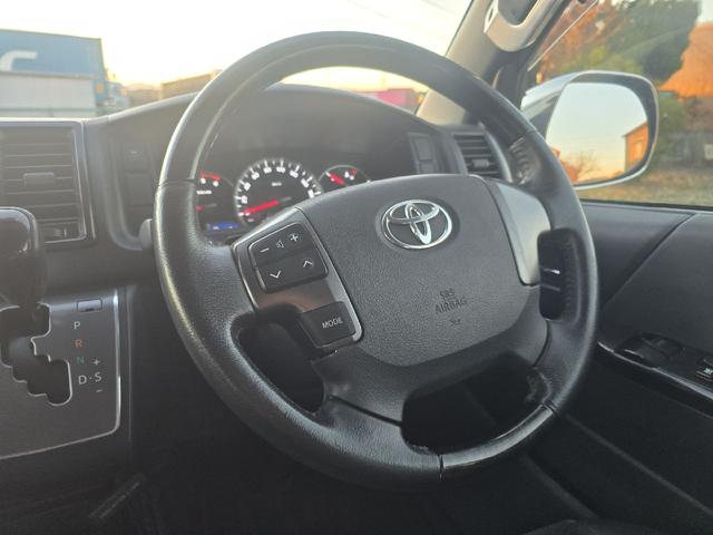 ハイエースバン ロングスーパーＧＬマルチロールトランスポータタイプＩ　ダークプライム　ディーゼルターボ　モデリスタエアロ　ＬＥＤオプションヘッドライト　リアスポイラー　パールホワイト　ハーフレザーシート　両側スライドドア　テレビ　バックカメラ　プッシュスタート　ＥＴＣ（29枚目）