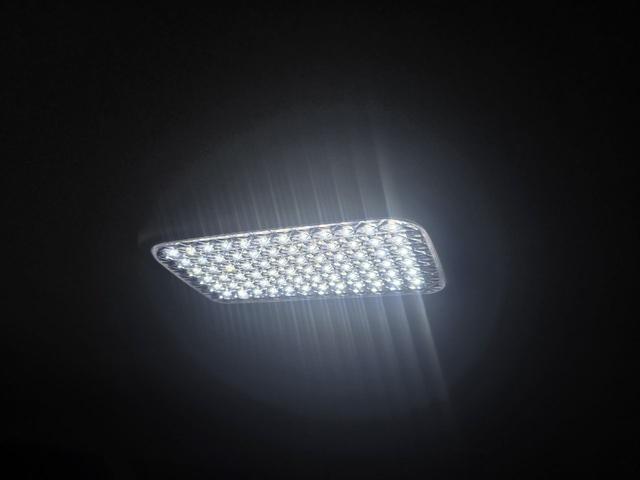 ハイエースバン ロングスーパーＧＬマルチロールトランスポータタイプＩ　ダークプライム　ディーゼルターボ　モデリスタエアロ　ＬＥＤオプションヘッドライト　リアスポイラー　パールホワイト　ハーフレザーシート　両側スライドドア　テレビ　バックカメラ　プッシュスタート　ＥＴＣ（35枚目）