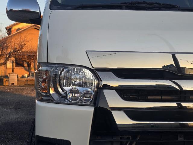 ハイエースバン ロングスーパーＧＬマルチロールトランスポータタイプＩ　ダークプライム　ディーゼルターボ　モデリスタエアロ　ＬＥＤオプションヘッドライト　リアスポイラー　パールホワイト　ハーフレザーシート　両側スライドドア　テレビ　バックカメラ　プッシュスタート　ＥＴＣ（39枚目）