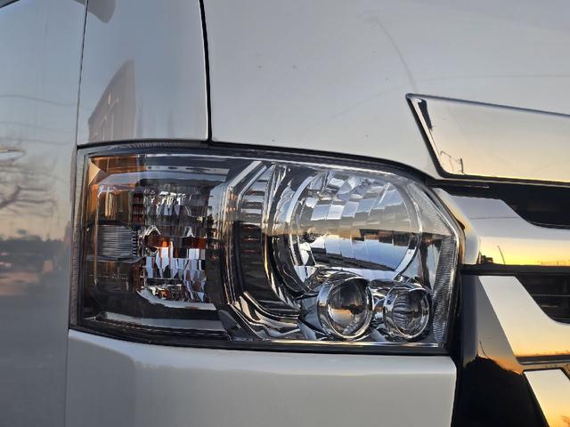ハイエースバン ロングスーパーＧＬマルチロールトランスポータタイプＩ　ダークプライム　ディーゼルターボ　モデリスタエアロ　ＬＥＤオプションヘッドライト　リアスポイラー　パールホワイト　ハーフレザーシート　両側スライドドア　テレビ　バックカメラ　プッシュスタート　ＥＴＣ（40枚目）
