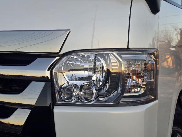 ハイエースバン ロングスーパーＧＬマルチロールトランスポータタイプＩ　ダークプライム　ディーゼルターボ　モデリスタエアロ　ＬＥＤオプションヘッドライト　リアスポイラー　パールホワイト　ハーフレザーシート　両側スライドドア　テレビ　バックカメラ　プッシュスタート　ＥＴＣ（41枚目）