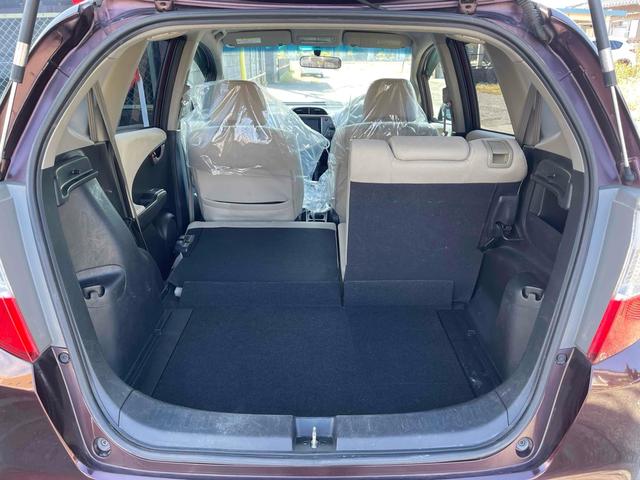 フィット X ETC オートクルーズコントロール スマートキー 電動格納ミラー シートヒーター CVT 盗難防止システム 衝突安全ボディ ABS CD エアコン パワーステアリング パワーウィンドウ(26枚目)