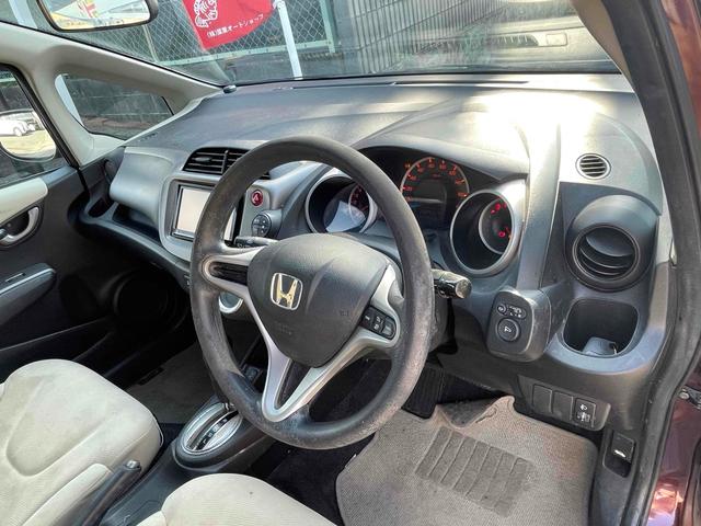 フィット X ETC オートクルーズコントロール スマートキー 電動格納ミラー シートヒーター CVT 盗難防止システム 衝突安全ボディ ABS CD エアコン パワーステアリング パワーウィンドウ(35枚目)