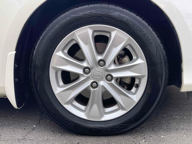 フィットハイブリッド ナビプレミアムセレクション　ハイブリッド　ＥＴＣ　バックカメラ　ナビ　ＴＶ　オートクルーズコントロール　オートライト　ＨＩＤ　スマートキー　アイドリングストップ　電動格納ミラー　シートヒーター　ＣＶＴ　盗難防止システム（21枚目）