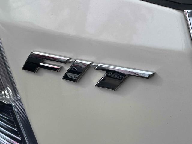 フィットハイブリッド ナビプレミアムセレクション　ハイブリッド　ＥＴＣ　バックカメラ　ナビ　ＴＶ　オートクルーズコントロール　オートライト　ＨＩＤ　スマートキー　アイドリングストップ　電動格納ミラー　シートヒーター　ＣＶＴ　盗難防止システム（46枚目）