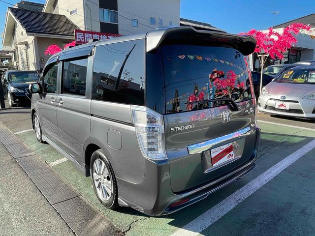 ステップワゴンスパーダ パワーエディション　ＥＴＣ　バックカメラ　ナビ　ＴＶ　両側電動スライドドア　ＨＩＤ　スマートキー　アイドリングストップ　電動格納ミラー　後席モニター　３列シート　ＣＶＴ　アルミホイール　盗難防止システム　衝突安全ボディ（19枚目）