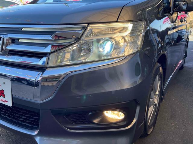 ステップワゴンスパーダ パワーエディション　ＥＴＣ　バックカメラ　ナビ　ＴＶ　両側電動スライドドア　ＨＩＤ　スマートキー　アイドリングストップ　電動格納ミラー　後席モニター　３列シート　ＣＶＴ　アルミホイール　盗難防止システム　衝突安全ボディ（49枚目）