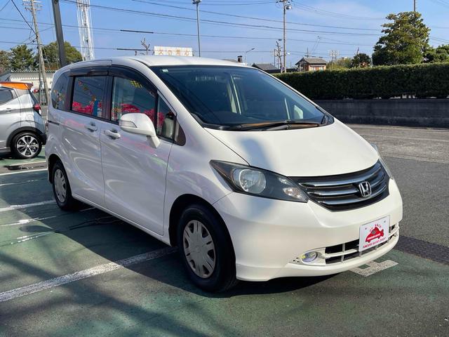 フリード Ｇ　ハイウェイエディション　ＥＴＣ　バックカメラ　ナビ　両側スライド・片側電動　ＨＩＤ　キーレスエントリー　電動格納ミラー　後席モニター　ウォークスルー　ＣＶＴ　衝突安全ボディ　ＡＢＳ　エアコン　パワーステアリング（13枚目）