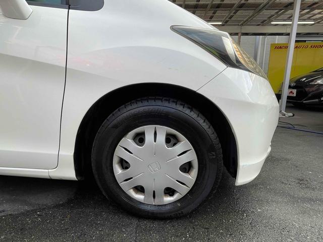 フリード Ｇ　ハイウェイエディション　ＥＴＣ　バックカメラ　ナビ　両側スライド・片側電動　ＨＩＤ　キーレスエントリー　電動格納ミラー　後席モニター　ウォークスルー　ＣＶＴ　衝突安全ボディ　ＡＢＳ　エアコン　パワーステアリング（26枚目）