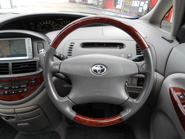 エスティマＬ Ｇ　ツインムーンルーフ　Ｖ６／３０００　回転シート　８人乗　ナビ／ＡＭ／ＦＭ／ＣＤチューナー　ＥＴＣ　ＵＶ＆プライバシーガラス　Ｗエアコン　キーレス　ウッドコンビハンドル　チルトステアリング　アームレスト（4枚目）