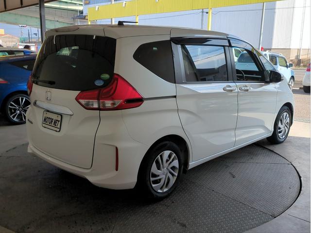 フリード Ｇ・ホンダセンシング　後席モニター　衝突軽減装置　両側電動スライド　追従クルコン　レーンアシスト　車線逸脱警報　バックカメラ　ＢＴオーディオ　ＣＤ・ＤＶＤ再生　純正ナビ　６人乗り　ＥＴＣ　アイドリングストップ　Ｐスタート（43枚目）