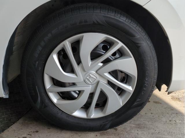 フリード Ｇ・ホンダセンシング　後席モニター　衝突軽減装置　両側電動スライド　追従クルコン　レーンアシスト　車線逸脱警報　バックカメラ　ＢＴオーディオ　ＣＤ・ＤＶＤ再生　純正ナビ　６人乗り　ＥＴＣ　アイドリングストップ　Ｐスタート（49枚目）