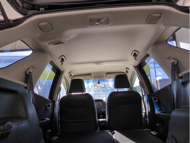 フィットシャトルハイブリッド ハイブリッド・スマートセレクション 純正ナビ オートクルコン ハーフレザーシート ワンオーナー車 スマートキー USB接続 CD・DVD再生 社外アルミ アイドリングストップ HIDライト オートライト 横滑り防止装置(28枚目)