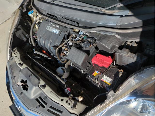 フィットシャトルハイブリッド ハイブリッド・スマートセレクション 純正ナビ オートクルコン ハーフレザーシート ワンオーナー車 スマートキー USB接続 CD・DVD再生 社外アルミ アイドリングストップ HIDライト オートライト 横滑り防止装置(50枚目)