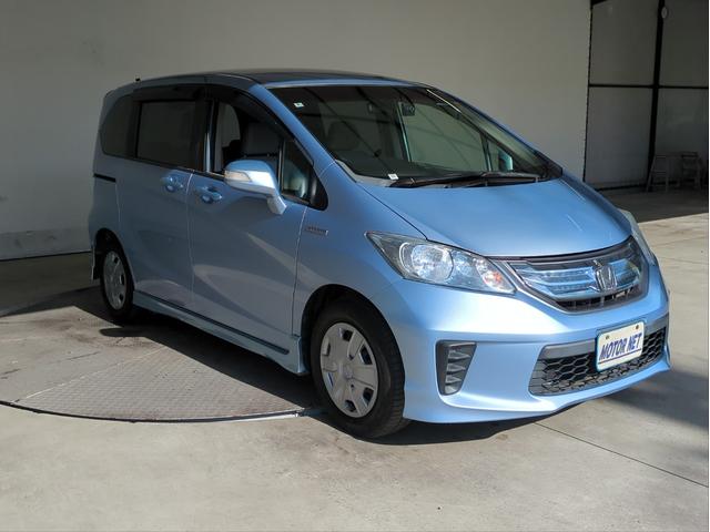 フリードハイブリッド ジャストセレクション　電動スライドドア　メモリーナビ　オ－トクルコン　ＨＩＤライト　オートライト　ドラレコ　ＥＴＣ　ＣＤ／ＤＶＤ再生　スマートキー　電動格納ミラー　ＵＳＢ接続　ウォークスルー（19枚目）