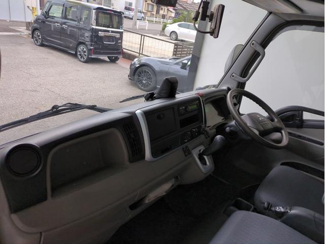 キャンター ロング全低床DX ドライブレコーダー ETC キーレス HID 電格ミラー バックカメラ 車線逸脱警報 木床 両3段工具棚 3方開 リアダブルタイヤ BTオーディオ ディーゼル車 AT 最積3000kg(8枚目)