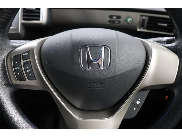 フリードスパイクハイブリッド ハイブリッド　エアバッグ　ウォークスルー　ナビＴＶ　パワーウインドウ　横滑り防止　メモリーナビ　キーレスキー　パワステ　Ｗエアバッグ　ＥＴＣ　オートエアコン　ＡＵＸ　ＡＢＳ　リアカメラ　取説記録　ＤＶＤ再生可（4枚目）