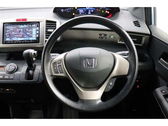 フリードスパイクハイブリッド ハイブリッド　エアバッグ　ウォークスルー　ナビＴＶ　パワーウインドウ　横滑り防止　メモリーナビ　キーレスキー　パワステ　Ｗエアバッグ　ＥＴＣ　オートエアコン　ＡＵＸ　ＡＢＳ　リアカメラ　取説記録　ＤＶＤ再生可（24枚目）