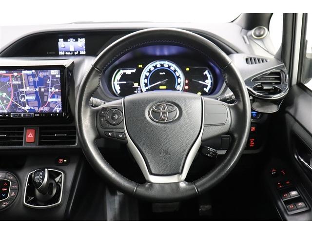 ヴォクシー ハイブリッドＶ　スマートキープッシュスタート　盗難防止アラーム　記録簿有　ＤＶＤ再生可　Ｂモニター　オートクルーズ　Ｗエアバック　ナビＴＶ　ＥＳＣ　ＥＴＣ車載器　リモコンキー　ＰＳ　ＬＥＤヘットライト　３列　アルミ（5枚目）