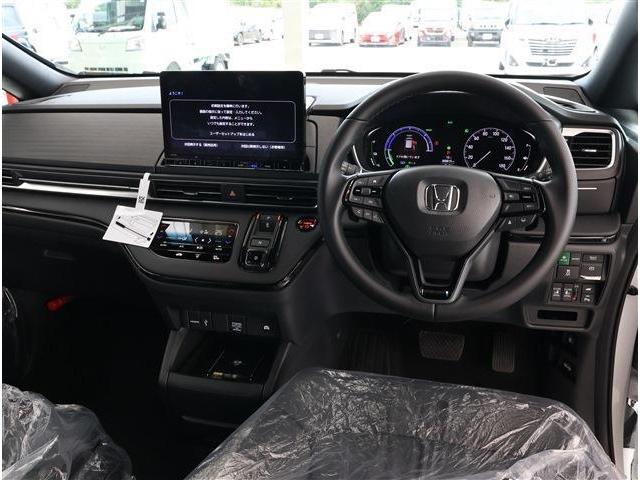 オデッセイハイブリッド ｅ：ＨＥＶアブソルート・ＥＸブラックエディション　登録済未使用車・１１．４型ナビ・ＴＶ・３６０カメラ付（3枚目）