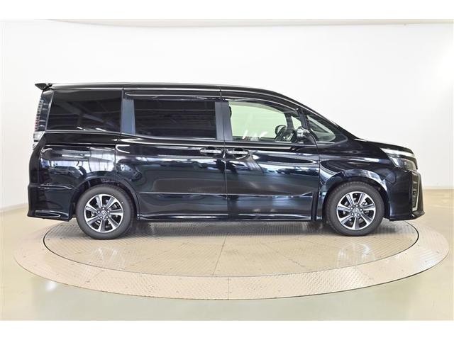 ヴォクシー ZS 煌 地上デジタル TSS 両側パワードア アイドリングストップ車 パワーウィンド 横滑防止 整備記録簿 DVD可 盗難防止装置 スマートエントリー Bカメラ AUX LEDヘッドライト メモリーナビ AW(4枚目)