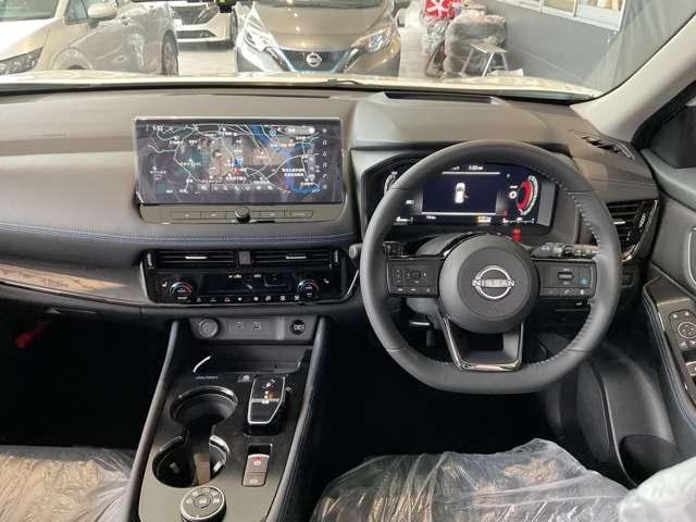 エクストレイル オーテック アドバンスドパッケージ e-4ORCE 雹害車/ニッサンコネクトナビゲーションシステム・SOSコール・インテリジェントルームミラー・アラウンドビューモニター・プロパイロット・左右後席温度調整独立制御エアコン・ワイヤレス充電器・ETC車載器(6枚目)