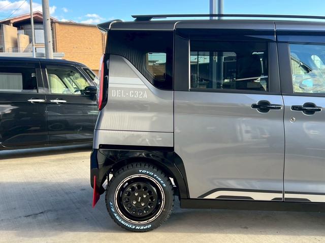 デリカミニ T 新品リフトアップサス(車検対応) 社外マッドブラック15インチアルミ オープンカントリー ホワイトレター グレーツートン クラリオンナビ Bluetooth フルセグTV バックモニター スマートキー(7枚目)