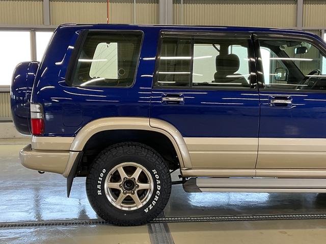 ビッグホーン プレジールＩＩ　４ＷＤ　オートエアコン　新品タイヤ　同色全塗装　自社保証あり　キーレスエントリー　ＡＷ１６インチ　　同色全塗装　新品タイヤ　社外アルミホイール　背面タイヤ（15枚目）