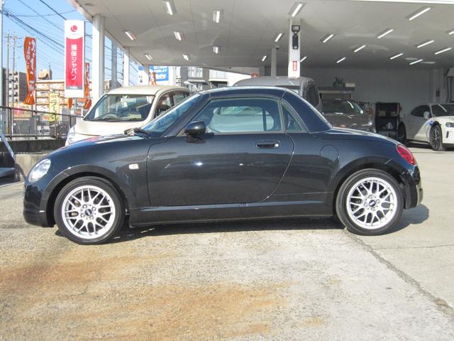 コペン 10thアニバーサリーエディション 最終特別仕様車・シリアルナンバー・電動アクティブトップ・ブラックメッキフロントグリル・プロジェクターヘッドランプ・フォグランプ・BBS15インチホイール・アルミスカッフプレート・本革製スポーツシート(10枚目)