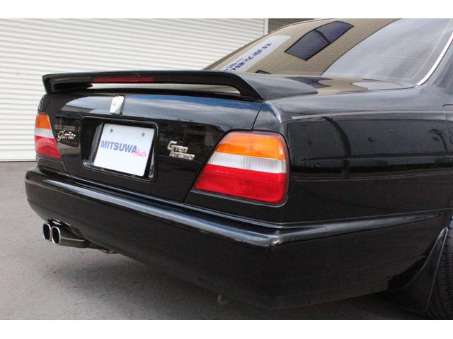 グロリア グランツーリスモアルティマ ターボ 実走行43000km マルチAVシステム・後席コントロール・リアスポイラー・車高調・クリアウインカー・ケンウッドCDデッキ・ウッドMOMOステアリング・ZEESプロジェクトマフラー・ザウバー17インチAW・フィルム・ETC(8枚目)