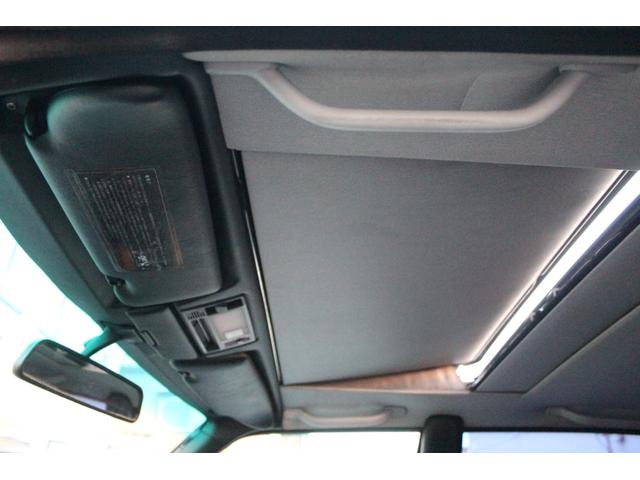 Sクラス 560SEL 修復歴なし 実走行 D車・左H・サンルーフ・黒革シートH・後席パワーシート・社外エアロ&マフラー&キーレス・クリアコーナーレンズ・リアガーニッシュ・AMG17AW・ETC(30枚目)