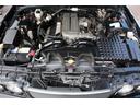 グランツーリスモアルティマ ターボ 実走行43000km マルチAVシステム・後席コントロール・リアスポイラー・車高調・クリアウインカー・ケンウッドCDデッキ・ウッドMOMOステアリング・ZEESプロジェクトマフラー・ザウバー17インチAW・フィルム・ETC(15枚目)