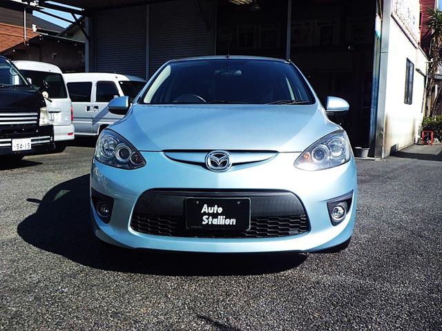 デミオ スポルト　５速マニュアルシフト　純正ワンセグ付きナビゲーション　ブルートゥースオーディオ対応　ＨＩＤヘッドランプ　キーレス　禁煙車（2枚目）