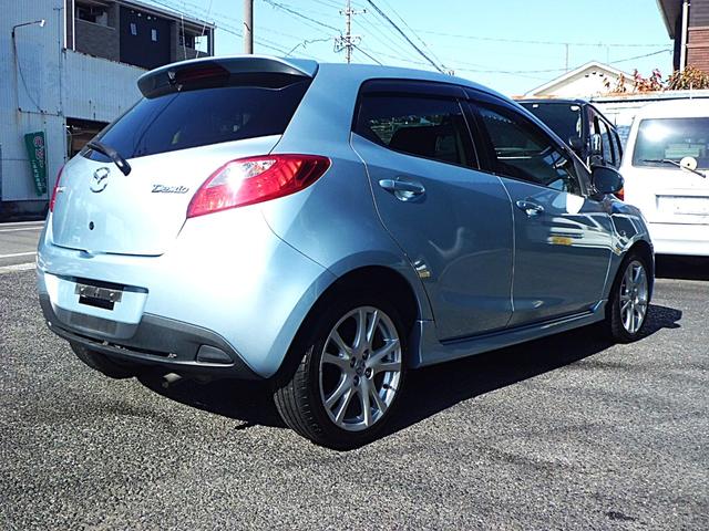 デミオ スポルト　５速マニュアルシフト　純正ワンセグ付きナビゲーション　ブルートゥースオーディオ対応　ＨＩＤヘッドランプ　キーレス　禁煙車（8枚目）