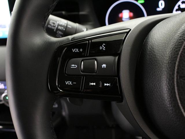 ヴェゼル ｅ：ＨＥＶＺ　弊社デモカー　プレミアムオーディオ　純正９インチコネクト対応ナビ　マルチビューカメラ　サイドカーテンエアバッグ　Ｂｌｕｅｔｏｏｔｈ　ワイヤレス充電器　パワーテールゲート　運転席助手席シートヒーター（7枚目）